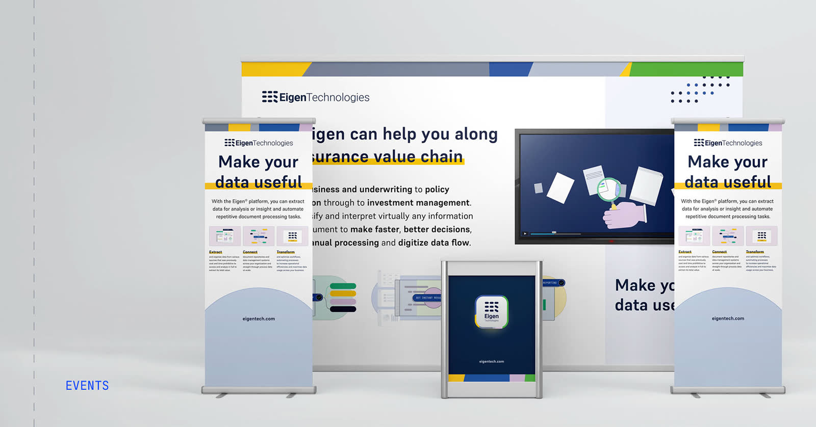 Eigen Technologies event display with branded banners, presentation screen and mobile application.