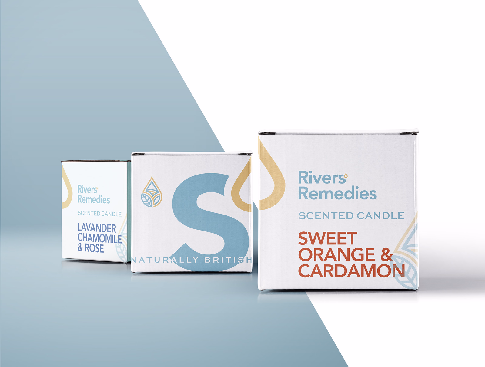 Rivers’ Remedies candle packaging arranged across a pale blue and white diagonal field.