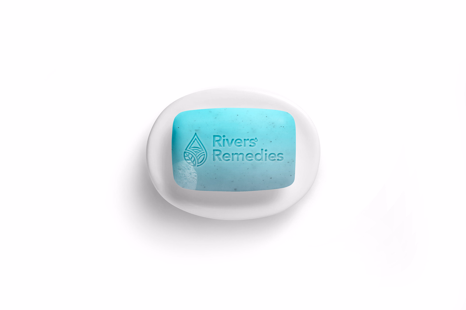 Rivers’ Remedies soap and product packaging arranged on a white surface.